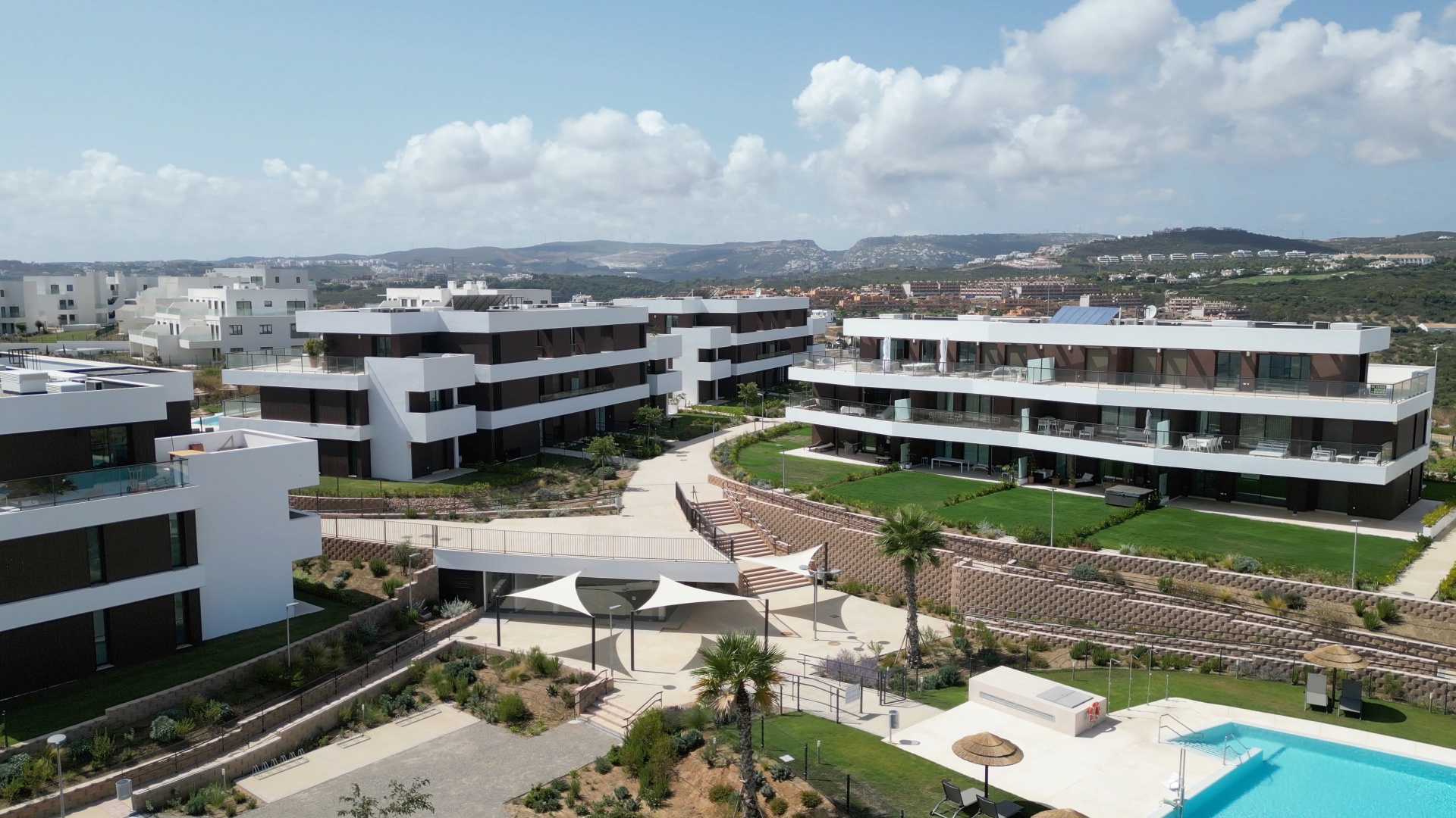 The community gardens and walkways between buildings